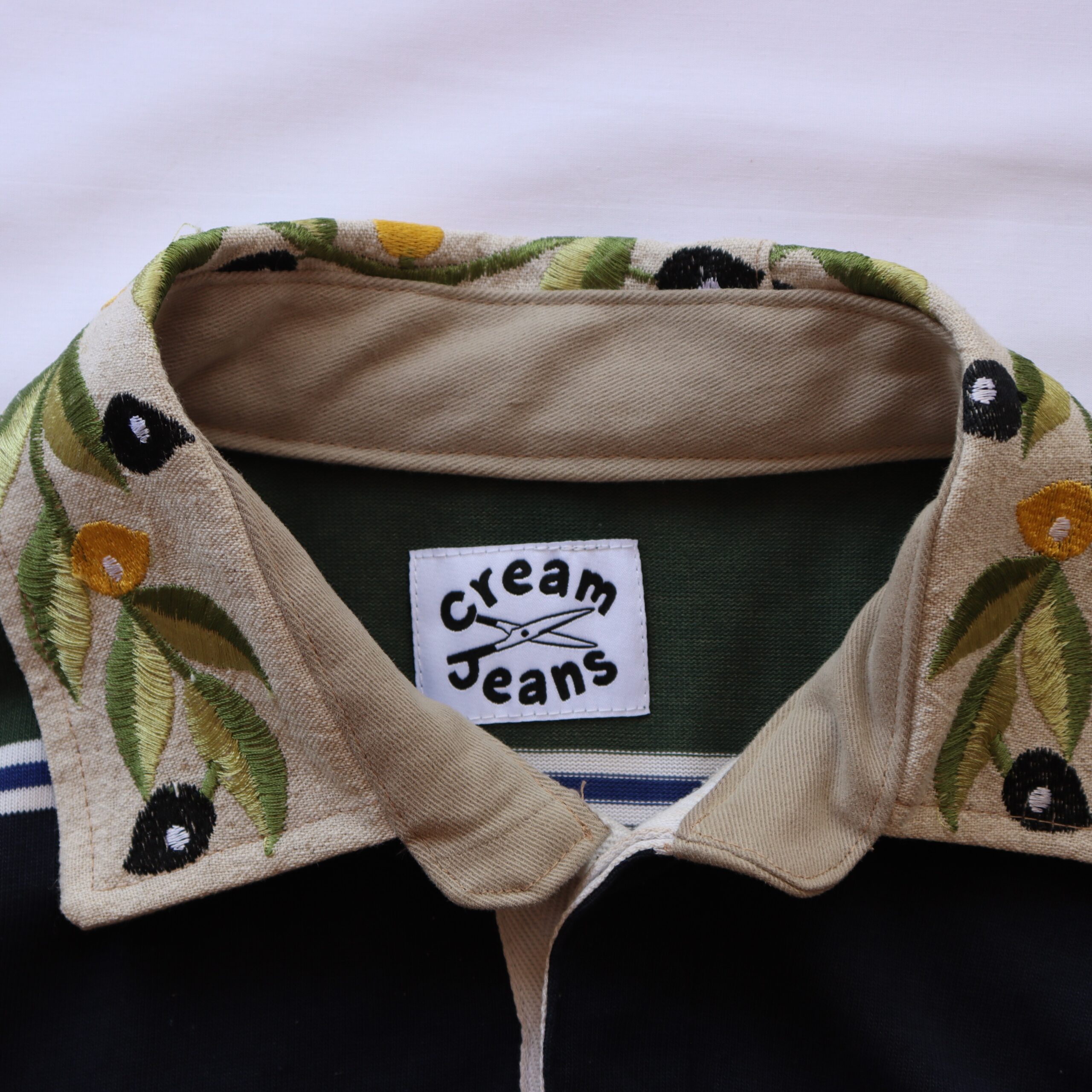 leafy green rugby polo