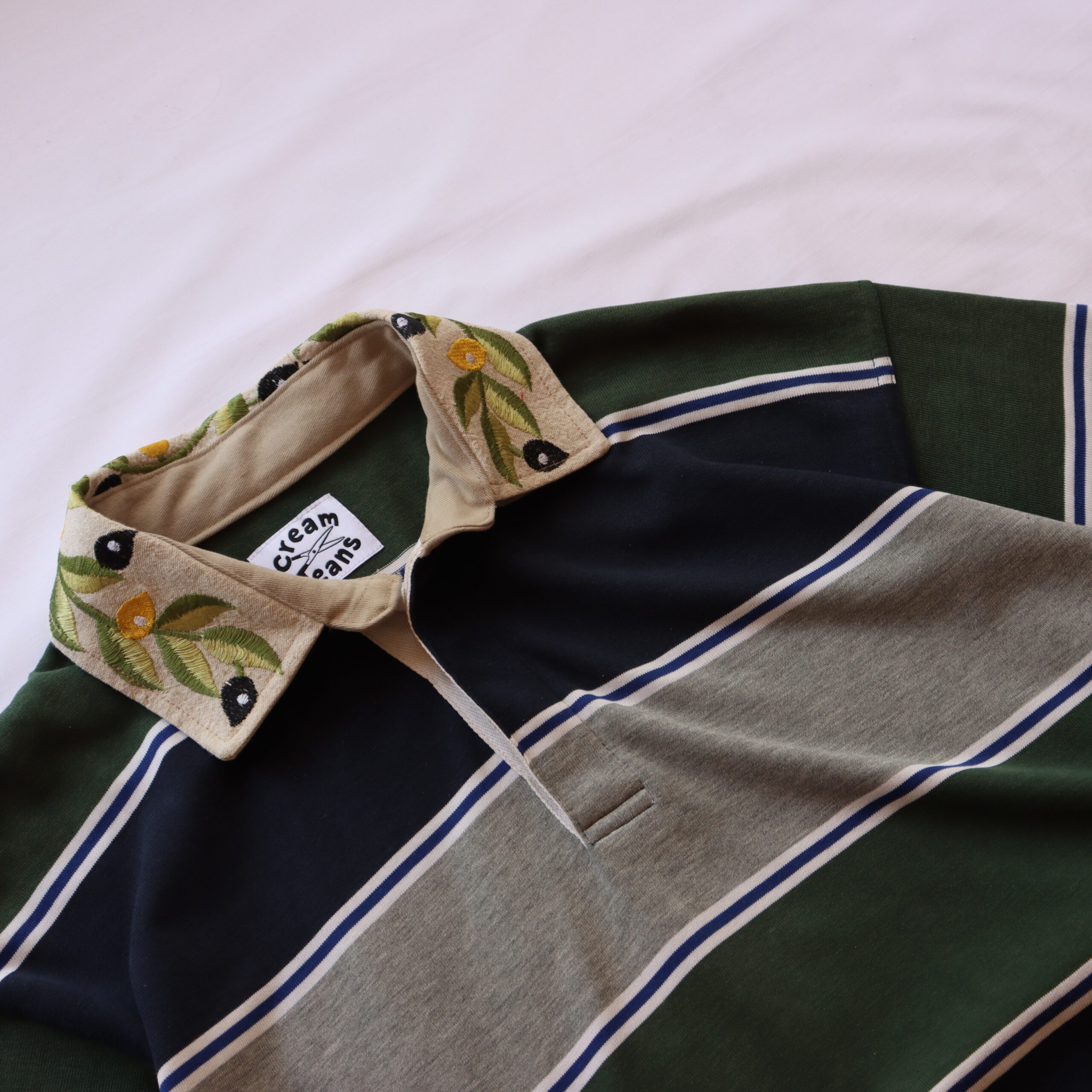 leafy green rugby polo