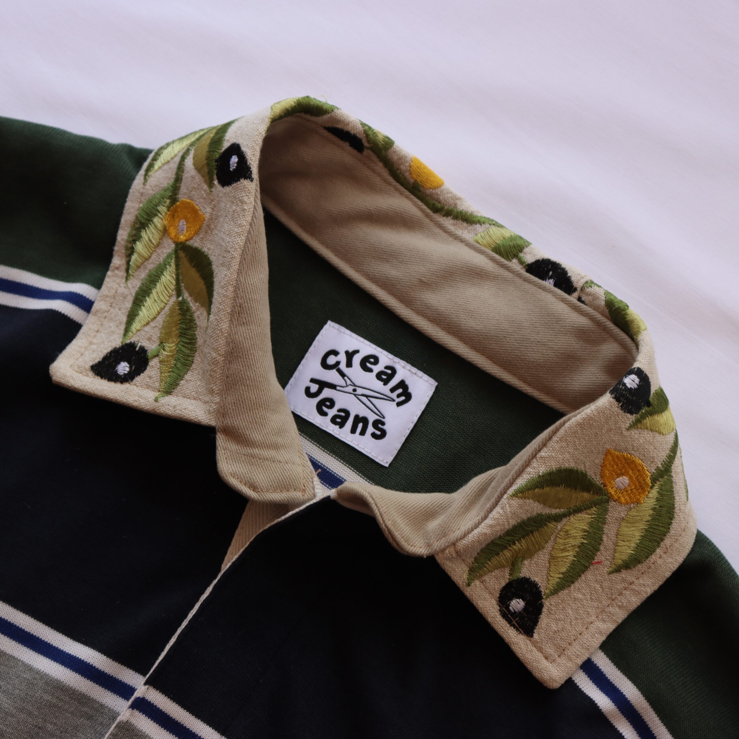 leafy green rugby polo