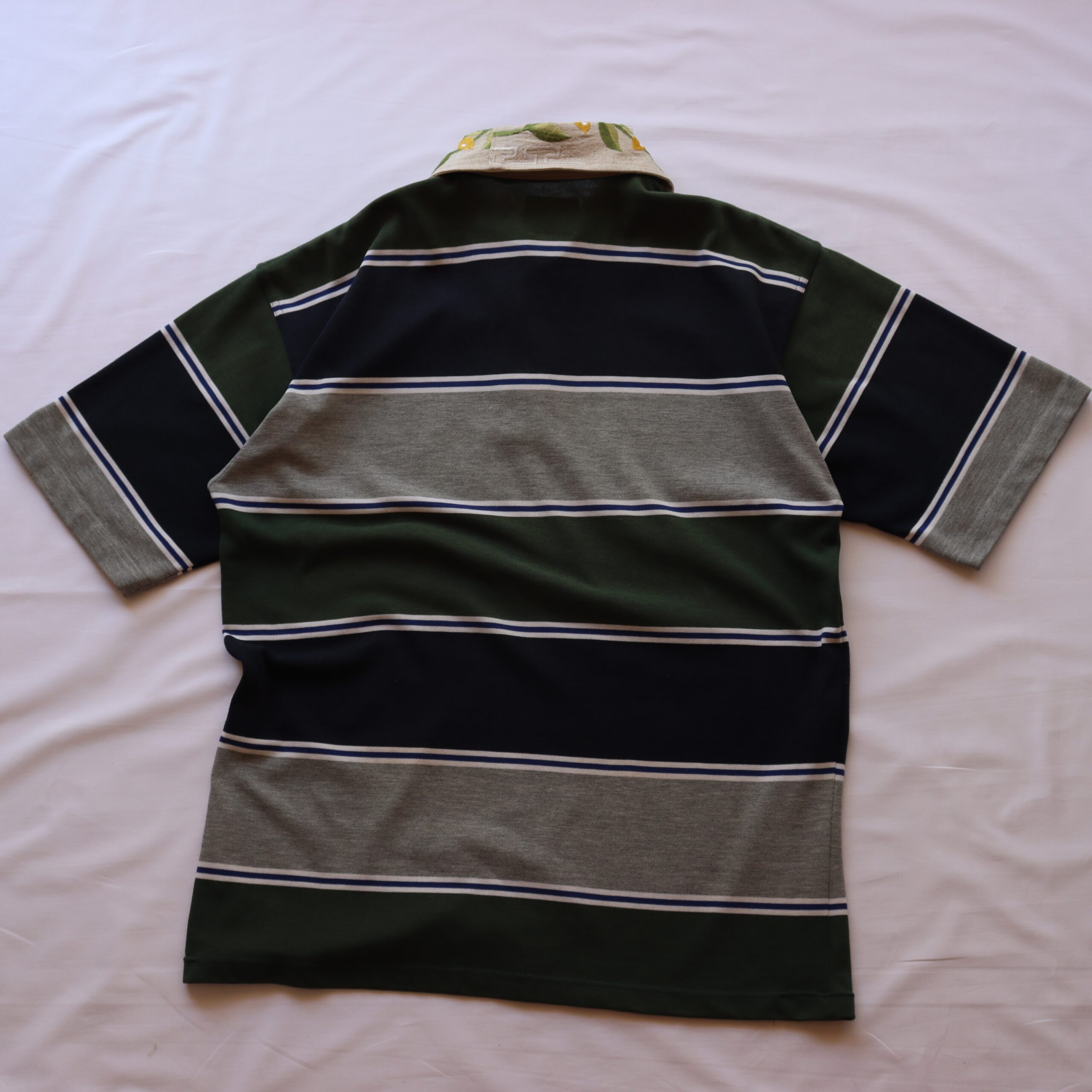 leafy green rugby polo