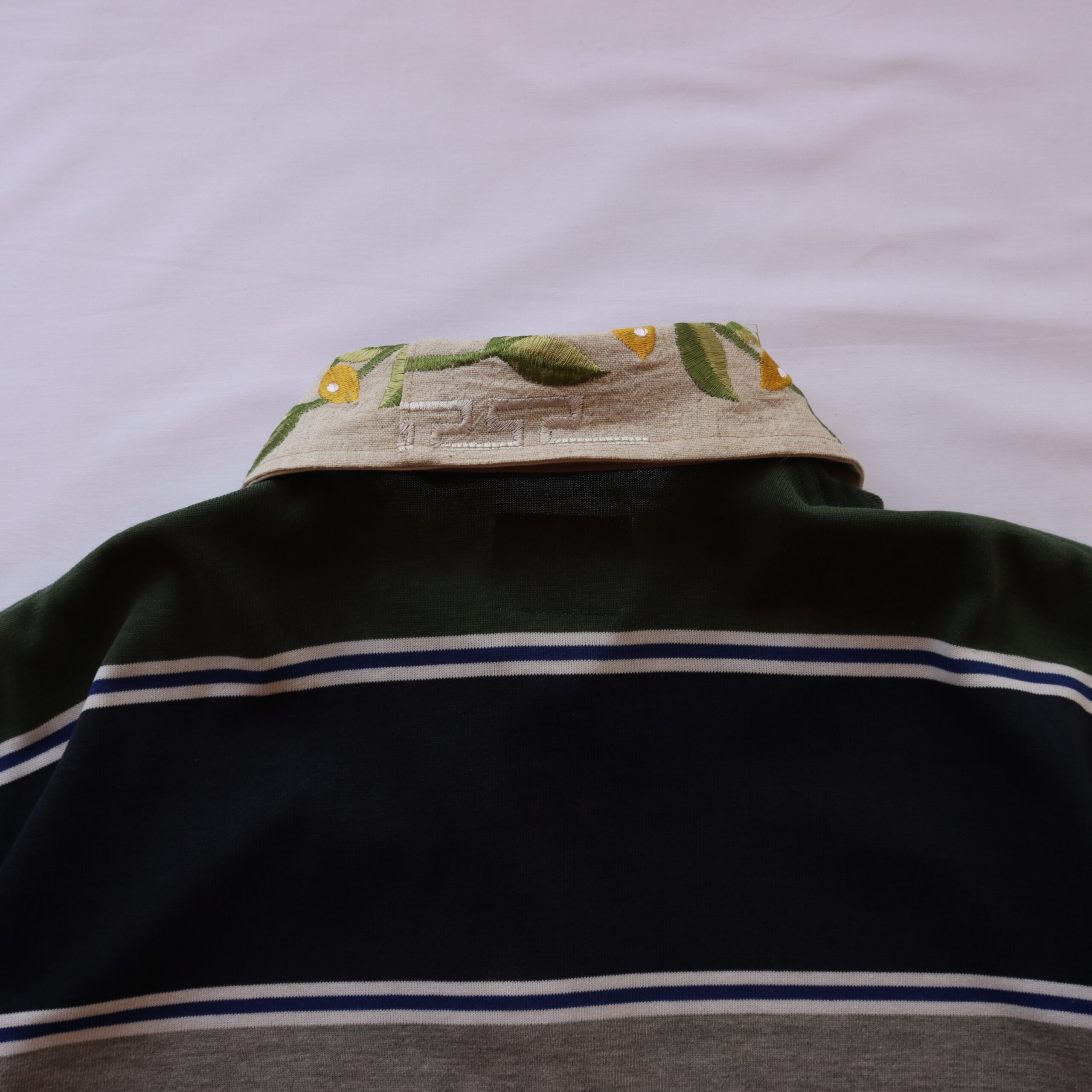 leafy green rugby polo